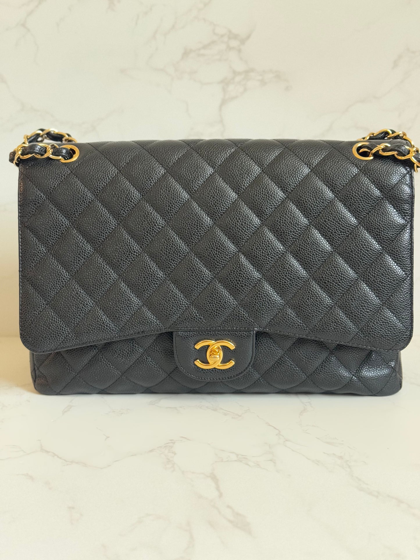 Chanel Black Caviar Maxi Single Flap w/ Gold Hardware
