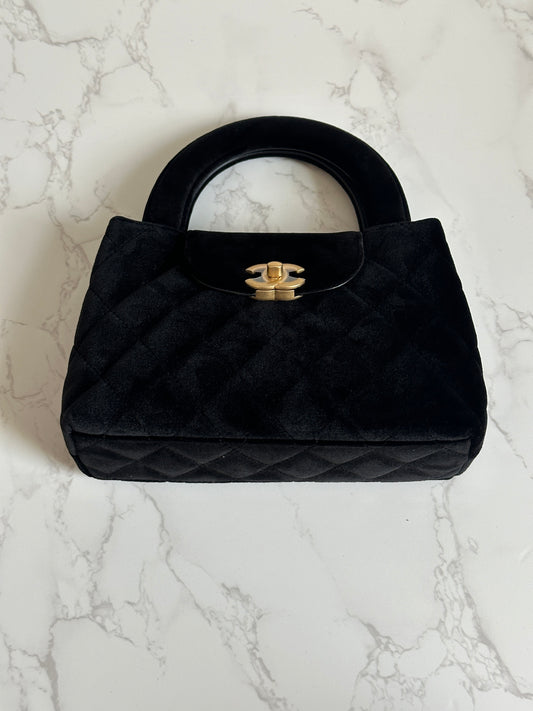 Chanel Vintage Top Handle Bag, velvet suede with a quilted pattern and gold-tone hardware.