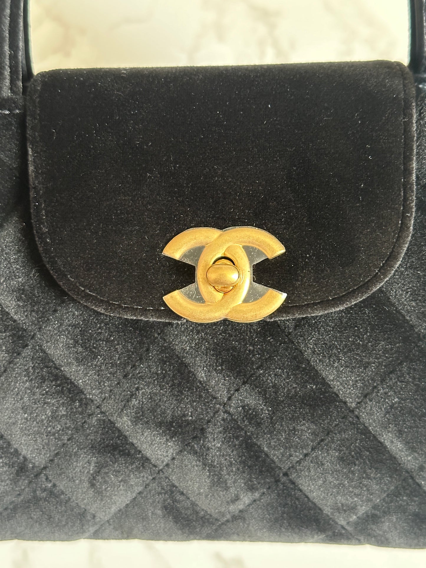 Chanel Vintage Top Handle Bag, velvet suede with a quilted pattern and gold-tone hardware.